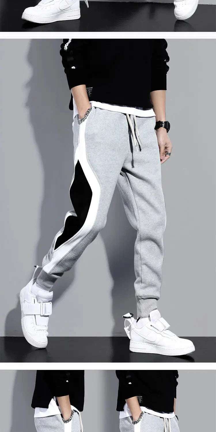 Pantalones anchos informales y sueltos para hombre, pantalones deportivos de retales de nueve puntos, cuerda elástica, transpirables, con lazo para los pies, otoño