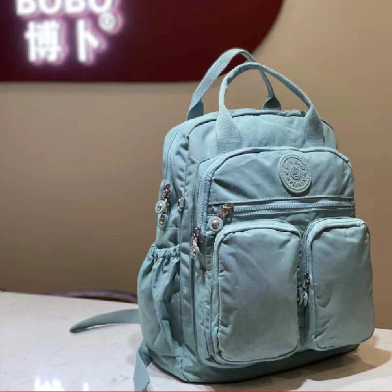 Mochila de moda para mujer, impermeable, de nailon, con mango suave, sólido, multibolsillo, con cremallera de viaje, mochilas escolares femeninas, mochila para ordenador portátil