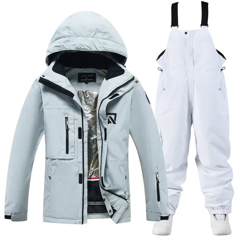 Traje de esquí para hombre y mujer, chaqueta de esquí impermeable a prueba de viento y pantalones con correa, traje cálido de invierno para pareja, novedad de 2023