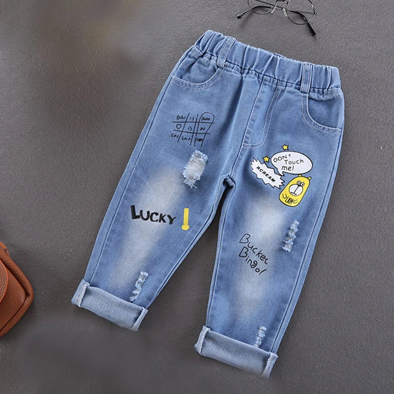 Primavera otoño niños Jeans niños algodón estampado empalme pantalones vaqueros elásticos pantalones coreanos para adolescentes ropa para niños DenimRipped