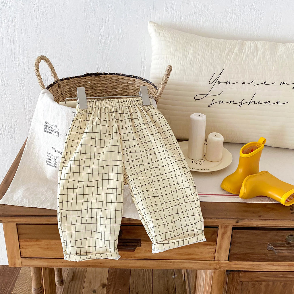 Pantalones sueltos informales para niños, ropa de primavera y verano, nuevos pantalones finos, simples y versátiles, ropa exterior, pantalones con estampado de dibujos animados para niños y niñas