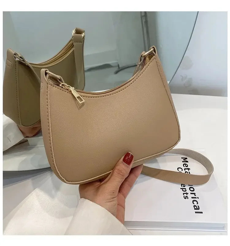 Bolso de mano Retro de cuero PU para mujer, bolsa de hombro y axilas, informal, Color sólido, a la moda, novedad