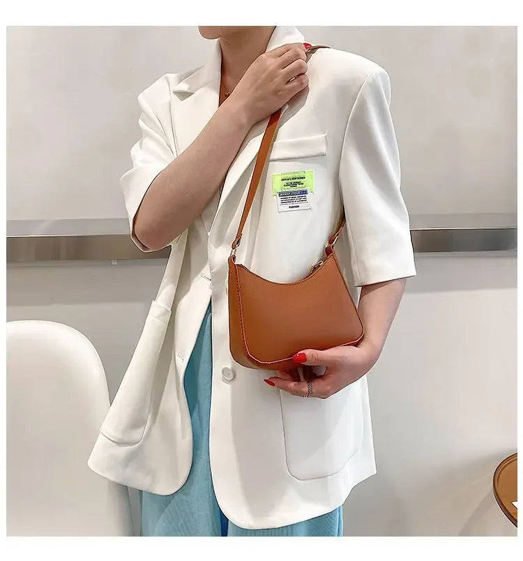 Bolso de mano Retro de cuero PU para mujer, bolsa de hombro y axilas, informal, Color sólido, a la moda, novedad