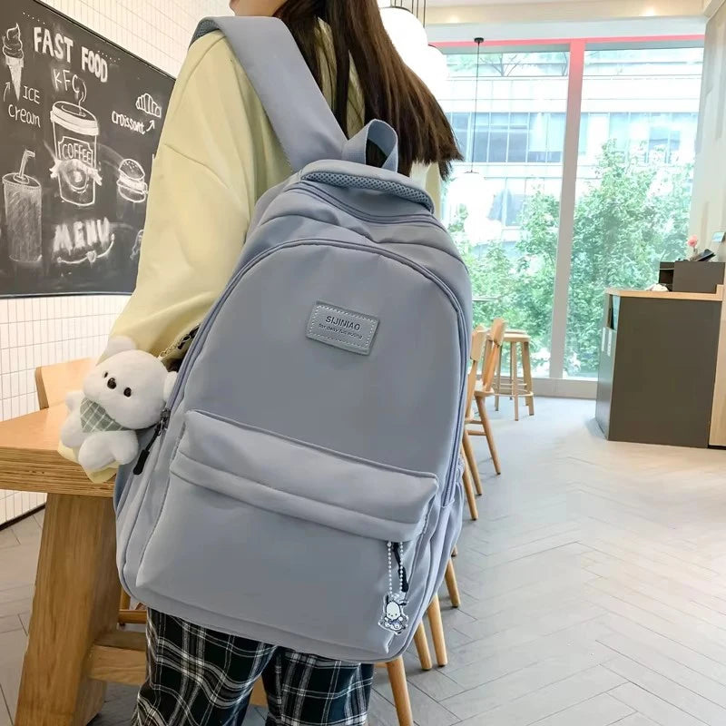 Nueva mochila universitaria impermeable de alta capacidad a la moda para hombre y mujer, mochilas escolares para ordenador portátil para mujer, bolsa de viaje para libros para chica bonita, genial