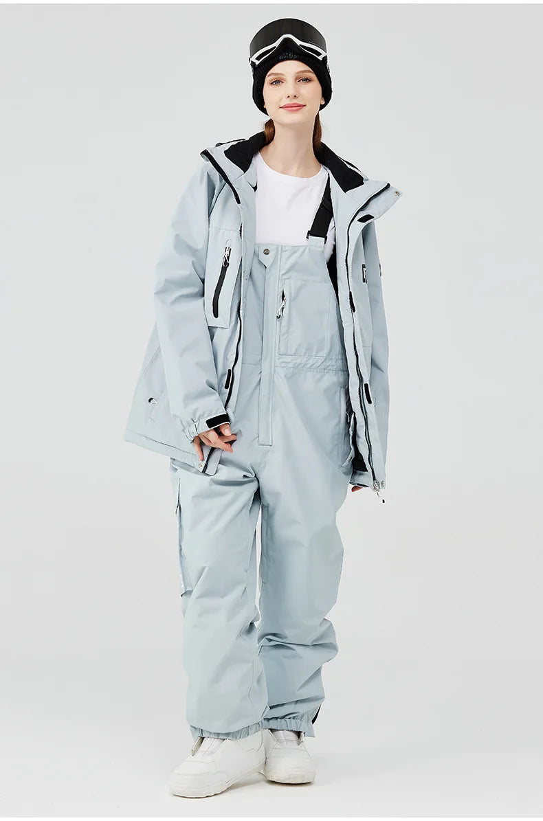 Traje de esquí para hombre y mujer, chaqueta de esquí impermeable a prueba de viento y pantalones con correa, traje cálido de invierno para pareja, novedad de 2023