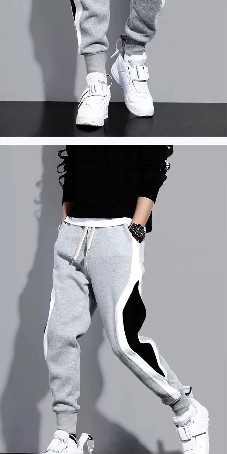 Pantalones anchos informales y sueltos para hombre, pantalones deportivos de retales de nueve puntos, cuerda elástica, transpirables, con lazo para los pies, otoño