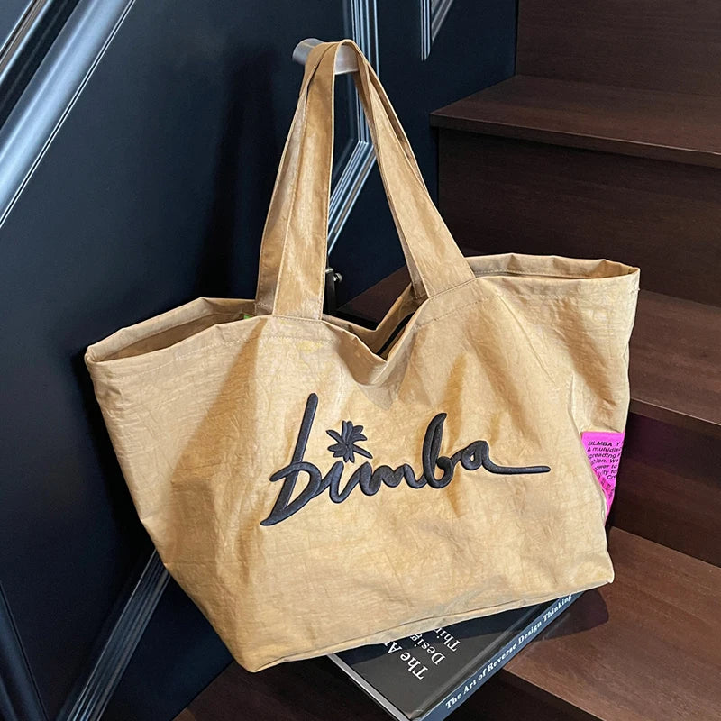 Bolso de mano popular de color sólido, moderno y sencillo, de gran capacidad, con letras bordadas informales personalizadas y multifuncionales