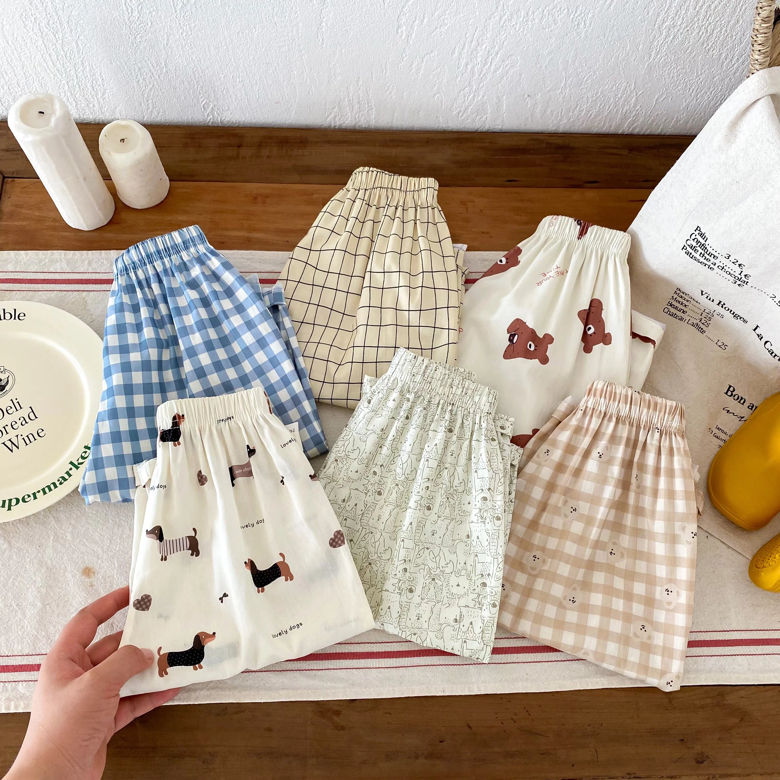 Pantalones sueltos informales para niños, ropa de primavera y verano, nuevos pantalones finos, simples y versátiles, ropa exterior, pantalones con estampado de dibujos animados para niños y niñas