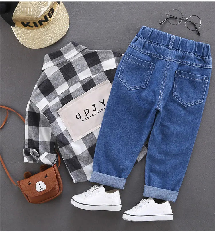 Primavera otoño niños Jeans niños algodón estampado empalme pantalones vaqueros elásticos pantalones coreanos para adolescentes ropa para niños DenimRipped