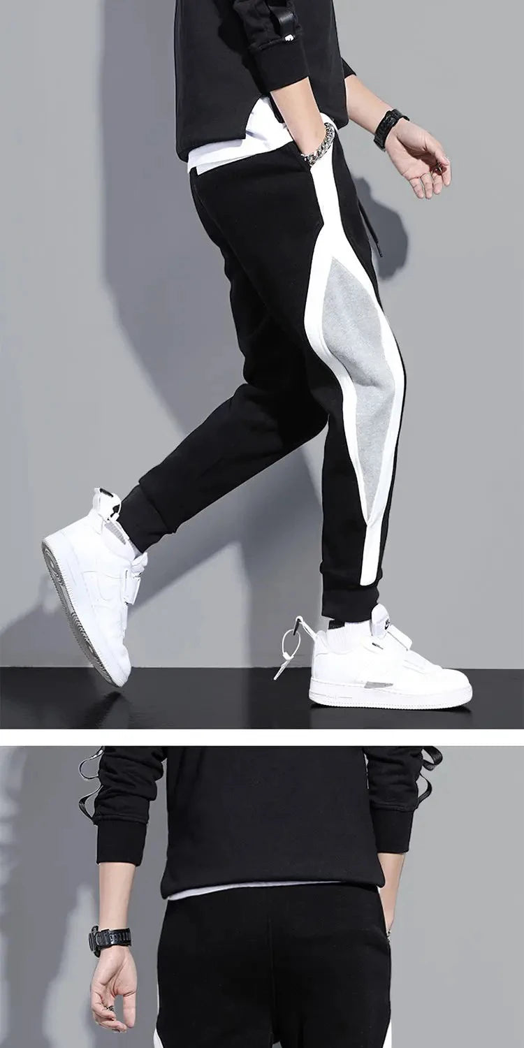 Pantalones anchos informales y sueltos para hombre, pantalones deportivos de retales de nueve puntos, cuerda elástica, transpirables, con lazo para los pies, otoño