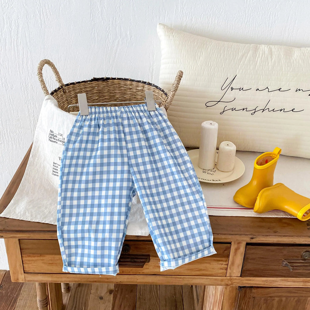 Pantalones sueltos informales para niños, ropa de primavera y verano, nuevos pantalones finos, simples y versátiles, ropa exterior, pantalones con estampado de dibujos animados para niños y niñas