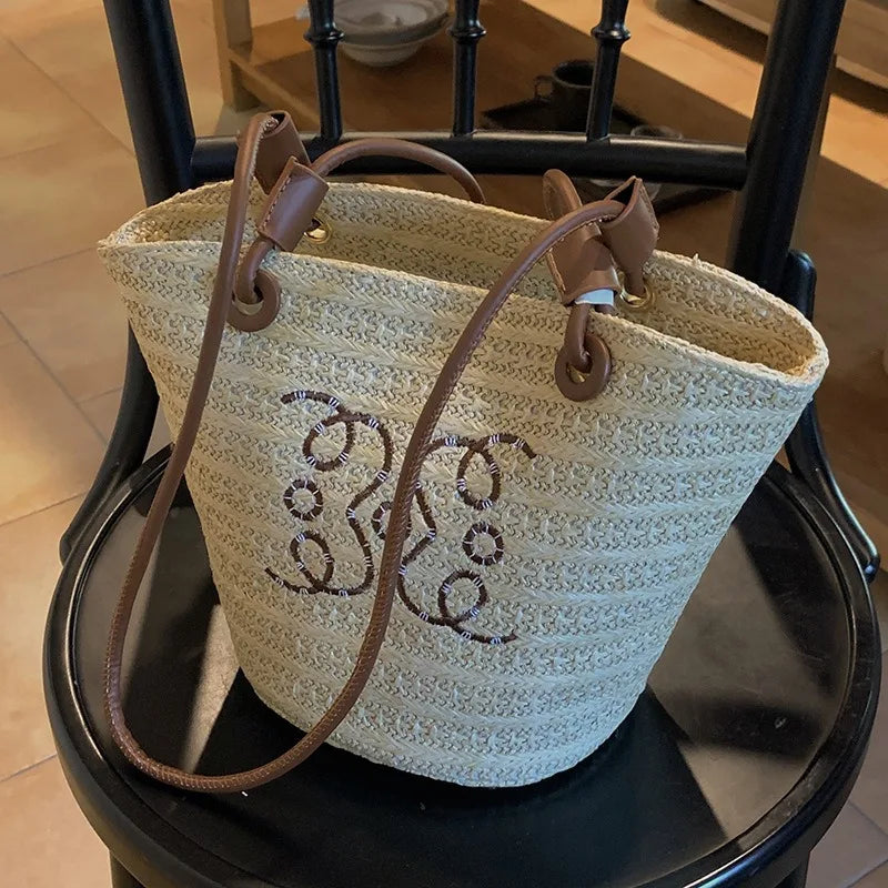 Bolso de hombro Retro a la moda, bolso de mano para mujer, bolso de diseñador de marca de lujo, bandolera de hombro de paja para mujer, bolsos de playa elegantes para mujer