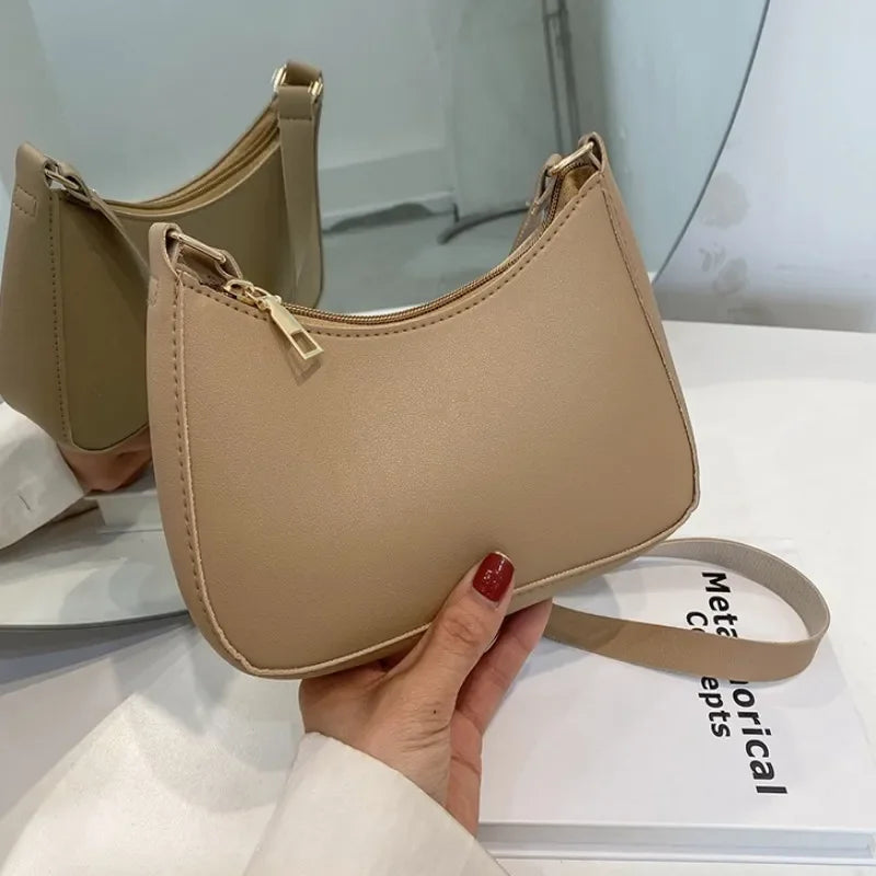 Bolso de mano Retro de cuero PU para mujer, bolsa de hombro y axilas, informal, Color sólido, a la moda, novedad