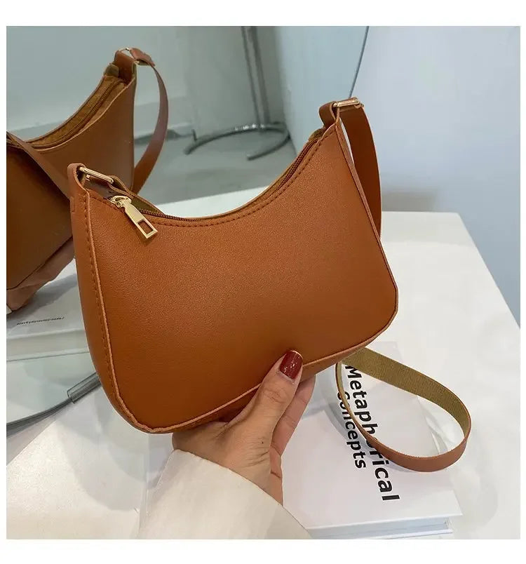Bolso de mano Retro de cuero PU para mujer, bolsa de hombro y axilas, informal, Color sólido, a la moda, novedad