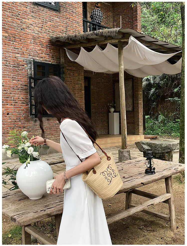 Bolso de hombro Retro a la moda, bolso de mano para mujer, bolso de diseñador de marca de lujo, bandolera de hombro de paja para mujer, bolsos de playa elegantes para mujer