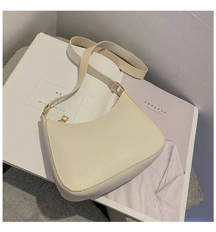 Bolso de mano Retro de cuero PU para mujer, bolsa de hombro y axilas, informal, Color sólido, a la moda, novedad