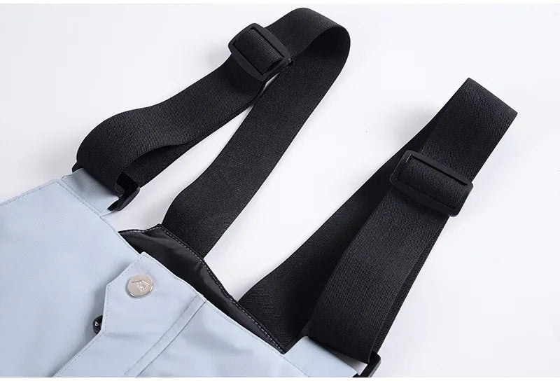 Traje de esquí para hombre y mujer, chaqueta de esquí impermeable a prueba de viento y pantalones con correa, traje cálido de invierno para pareja, novedad de 2023