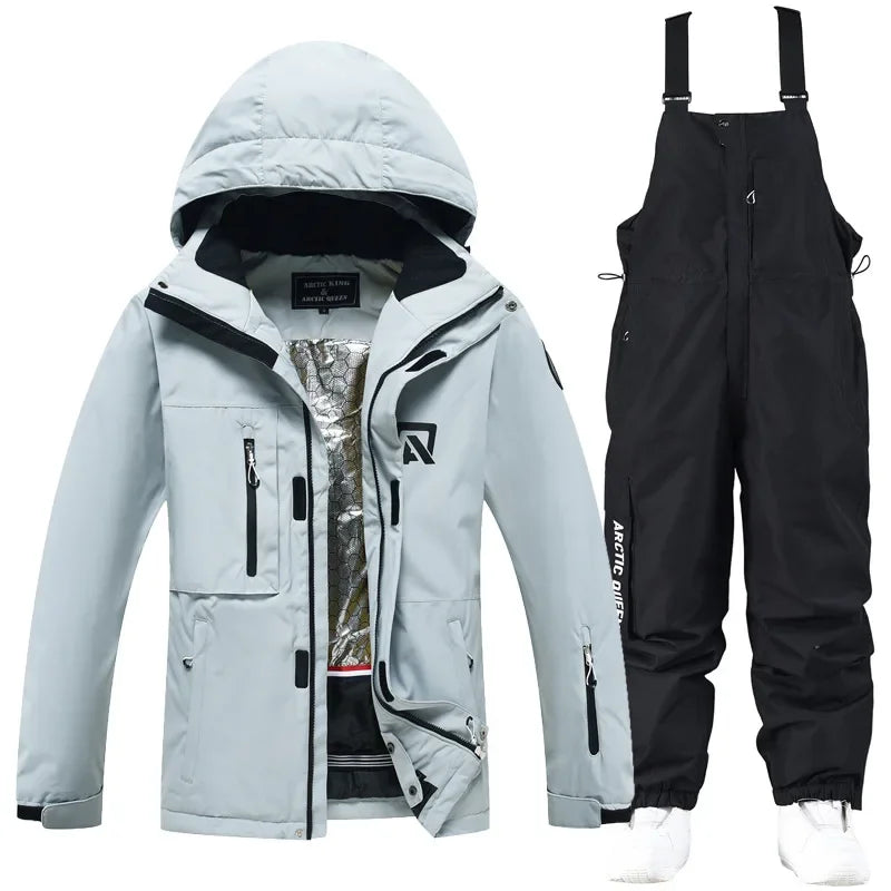 Traje de esquí para hombre y mujer, chaqueta de esquí impermeable a prueba de viento y pantalones con correa, traje cálido de invierno para pareja, novedad de 2023