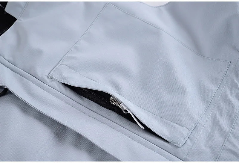 Traje de esquí para hombre y mujer, chaqueta de esquí impermeable a prueba de viento y pantalones con correa, traje cálido de invierno para pareja, novedad de 2023